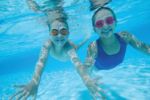 Two children underwater